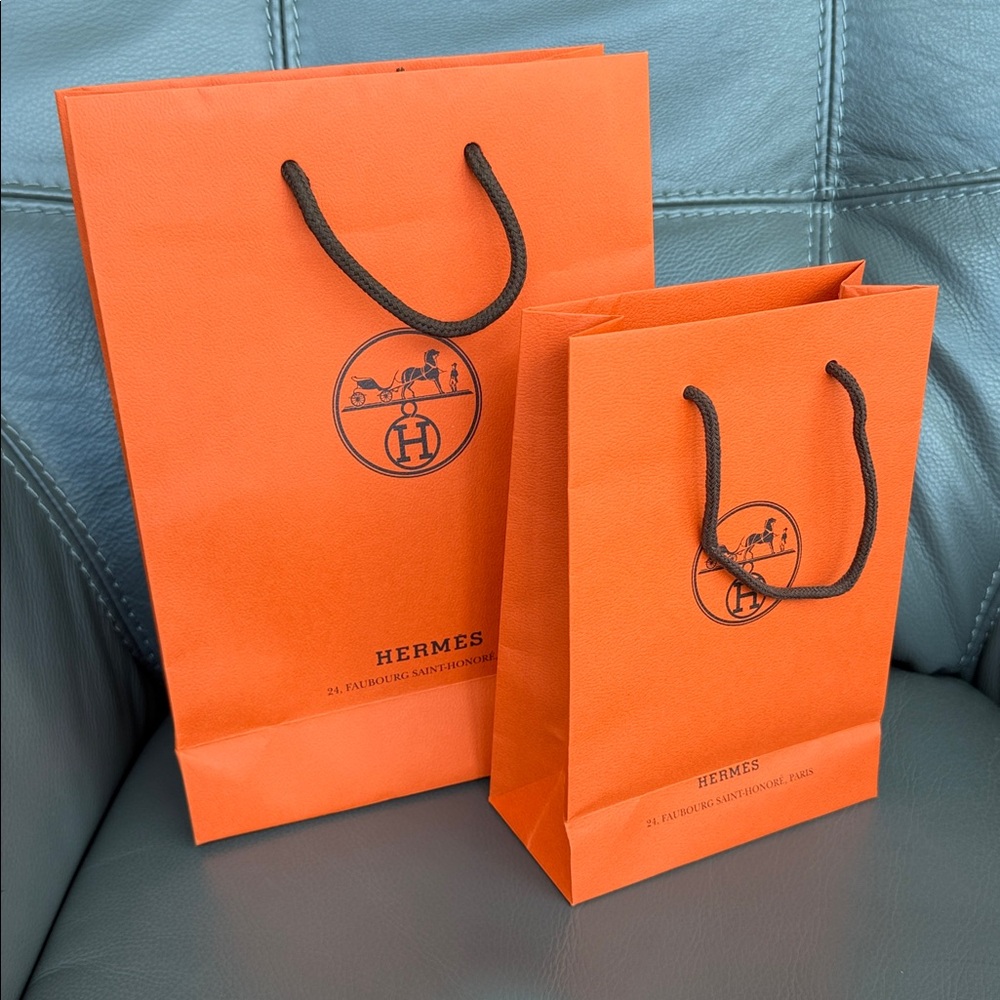 Hermes shopping gift orange bags 2 different sizes like new